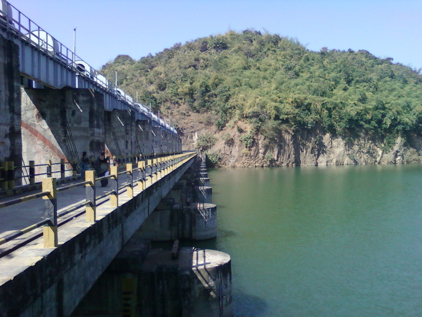 Bridge over the Yeleru dam with the reservoir behind